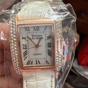 Women's White and Gold Watch